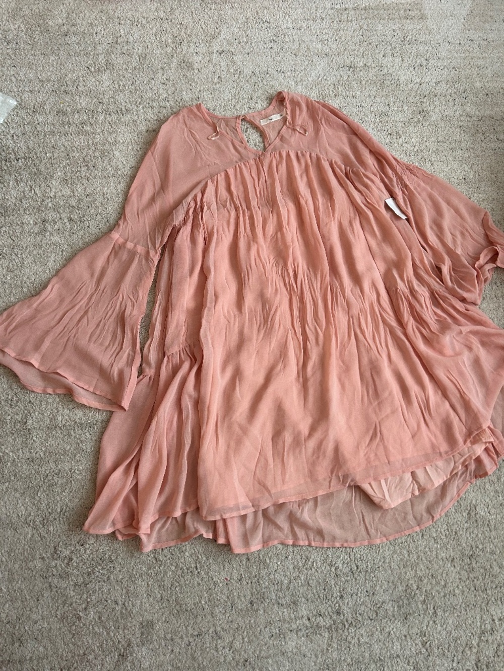 Peach flowy dress with bell sleeves